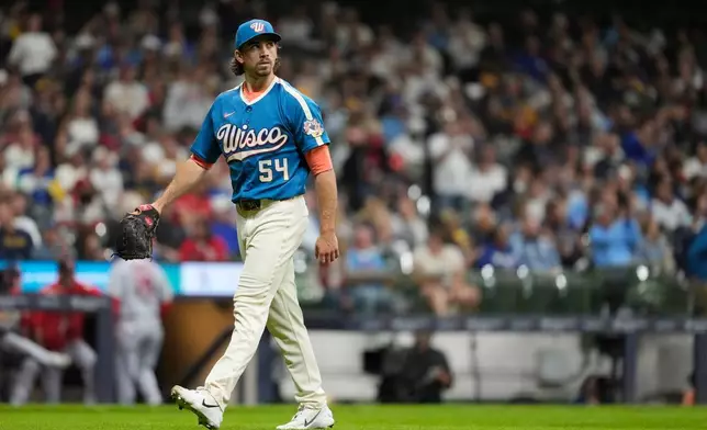 Milwaukee Brewers' Robert Gasser walks to the dugout during the sixth inning of a baseball game against the St. Louis Cardinals, Friday, Sept. 25, 2026, in Milwaukee. (AP Photo/Aaron Gash)