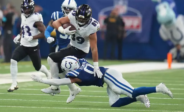 Baltimore Ravens' Mark Andrews tries to get past Indianapolis Colts' Cam Bynum during the second half of an NFL football game Sunday, Sept. 13, 2026, in Indianapolis. (AP Photo/Jeff Roberson)