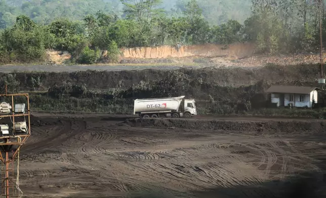 A truck operates at a coal mine near Samarinda, East Kalimantan, Indonesia, on Aug. 19, 2026. (AP Photo/Ahmad Mulia Panjaitan)