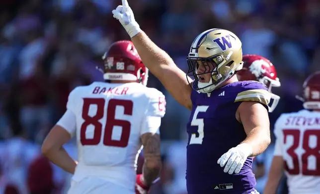 Washington defensive lineman Derek Colman-Brusa reacts after a field goal attempt by Washington State place-kicker Jack Stevens was no good during the second half of an NCAA college football game, Sunday, Sept. 6, 2026, in Seattle. (AP Photo/Lindsey Wasson)