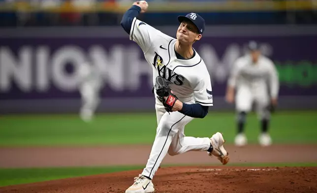 Tampa Bay Rays starting pitcher Griffin Jax throws to home plate during the first inning of a baseball game against the Boston Red Sox, Sunday, Sept. 20, 2026, in St. Petersburg, Fla. (AP Photo/Phelan M. Ebenhack)