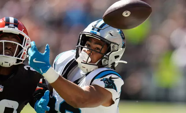 Carolina Panthers wide receiver Jalen Coker (18) misses a catch attempt against the Cleveland Browns during the first half of an NFL football game in Cleveland, Thursday, Aug. 27, 2026. (AP Photo/Sue Ogrocki)