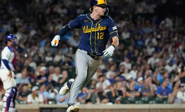 Milwaukee Brewers' Cooper Pratt runs after hitting a one-run single during the seventh inning of a baseball game against the Chicago Cubs in Chicago, Wednesday, Sept. 2, 2026. (AP Photo/Nam Y. Huh)