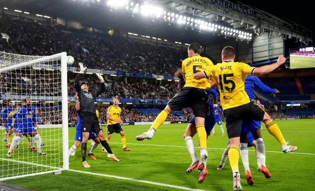Leeds United's Tarik Muharemovic scores, front left, scores the opening goal during the English League Cup soccer match between FC Chelsea and Leeds United in London, Wednesday, Sept. 9, 2026. (Adam Davy/PA via AP)