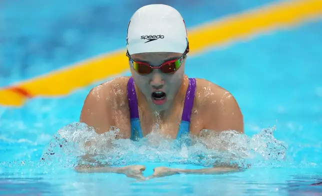 Yu Zidi of China competes in the women's 200-meter individual medley final in swimming at the Asian Games in Tokyo, Japan, Monday, Sept. 21, 2026. (AP Photo/Hiro Komae)