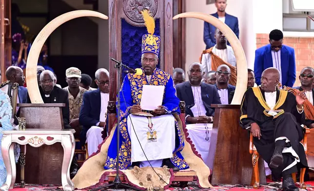 Journalist Edward Rukidi Kijanangoma delivers a speech during his coronation as king of Uganda's traditional Tooro Kingdom, in Fort Portal, Tuesday, Sept. 29, 2026. (AP Photo/Hajarah Nalwadda)