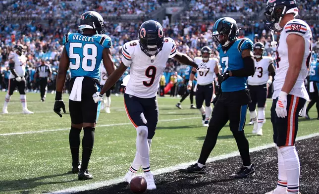Chicago Bears wide receiver Jahdae Walker (9) celebrates after scoring a touchdown during the second half of an NFL football game, Sunday, Sept. 13, 2026, in Charlotte, N.C. (AP Photo/Scott Kinser)