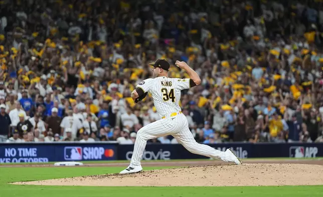 San Diego Padres pitcher Michael King (34) delivers against the Chicago Cubs in the sixth inning of Game 1 of the National League Wild Card baseball playoff series Tuesday, Sept. 29, 2026, in San Diego. (AP Photo/Gregory Bull)