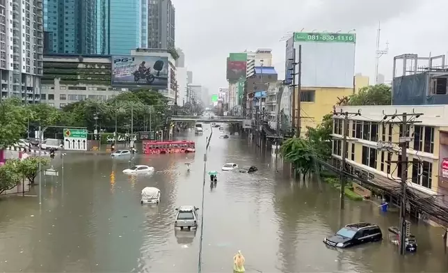 This image taken from a video shows the flooded streets in Bangkok, Thailand Saturday, Sept. 26, 2026, after heavy rain. (AP Photo)
