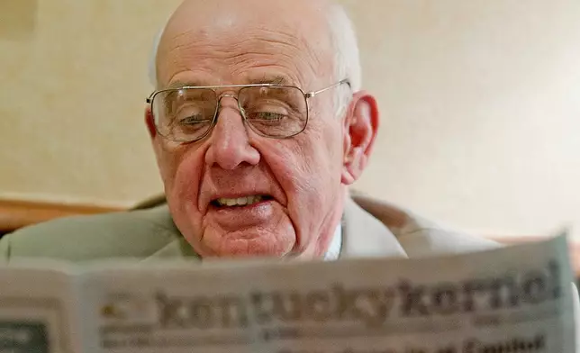 FILE - Kentucky author and poet Wendell Berry reads about himself, Feb. 14, 2011, in Frankfort, Ky. (AP Photo/The Independent, John Flavell, File)