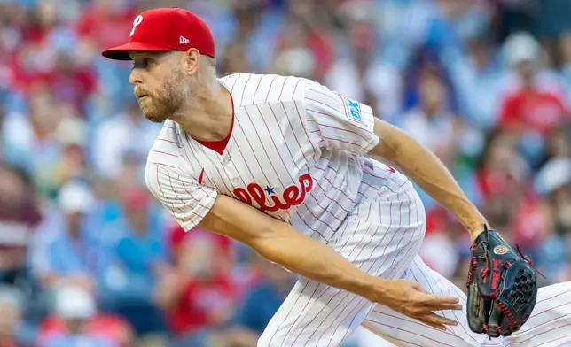 Philadelphia Phillies pitcher Zack Wheeler throws in the first inning of a baseball game against the Atlanta Braves, Saturday, Sept. 5, 2026, in Philadelphia. (AP Photo/Laurence Kesterson)