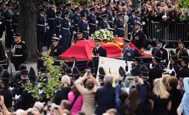 The coffin carrying Norways King Harald V arrives in the procession for his funeral at Oslo Cathedral in Oslo, Wednesday, Sept. 9, 2026. (AP Photo/Markus Schreiber)