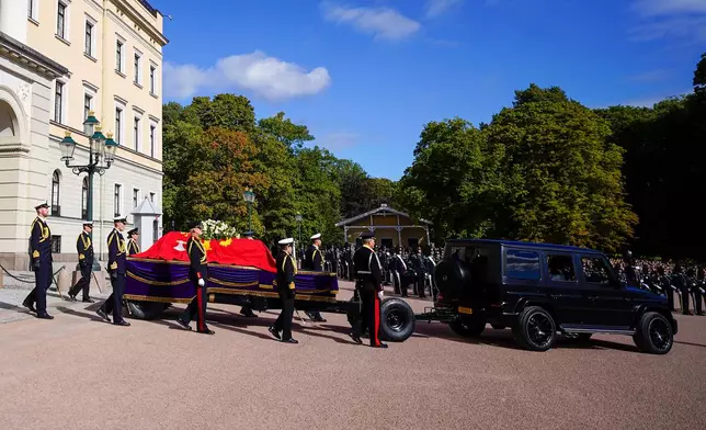 The coffin of King Harald V is taken in procession from the Royal Palace to Oslo Cathedral, in Oslo, Norway, Wednesday, Sept. 9, 2026. (Håkon Mosvold Larsen/NTB Scanpix via AP)
