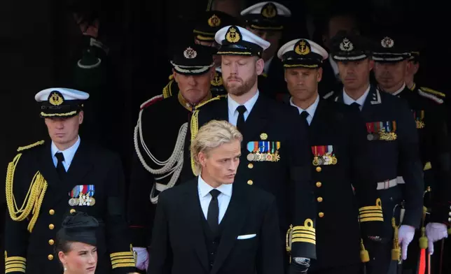 Norway's Marius Borg Hoiby, center, leaves the Oslo Cathedral after a funeral service for Norway's King Harald V in Oslo, Wednesday, Sept. 9, 2026. (AP Photo/Markus Schreiber)