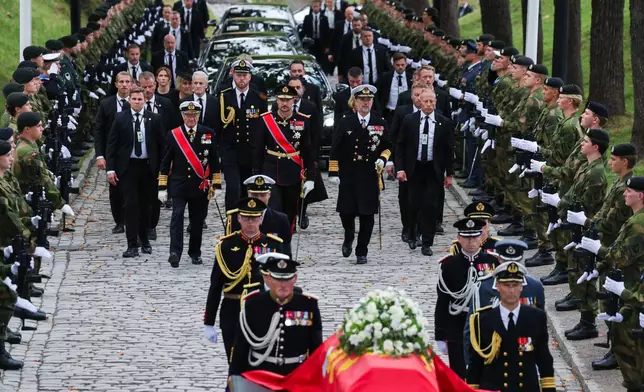 Norway's King Haakon VIII, King Carl Gustaf and King Frederik walk behind the bier carrying King Harald V from Oslo Cathedral to Akershus Fortress, Wednesday, Sept. 9, 2026. (Trond R. Teigen/NTB Scanpix via AP)
