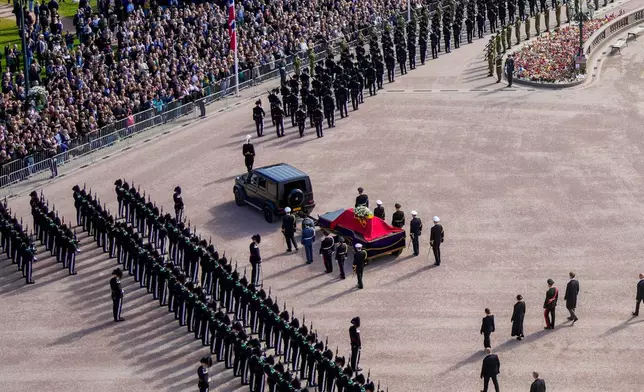 The coffin of King Harald V is taken in procession from the Royal Palace to Oslo Cathedral, in Oslo, Norway, Wednesday, Sept. 9, 2026. (Håkon Mosvold Larsen/NTB Scanpix via AP)