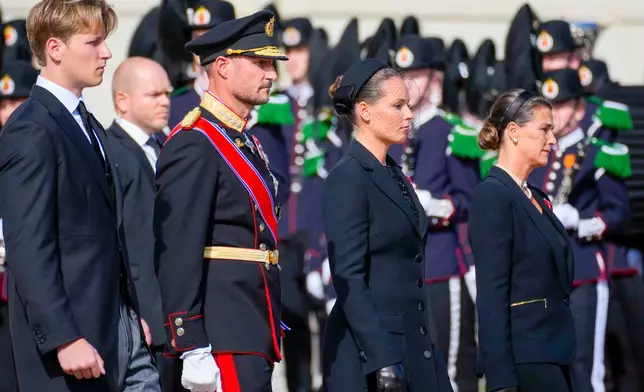 Members of Norway’s royal family, from left, Prince Sverre Magnus, King Haakon VIII, Crown Princess Ingrid Alexandra and Princess Märtha Louise walk behind the coffin of King Harald V as it is carried from the Royal Palace to Oslo Cathedral in Oslo, Norway, Wednesday, Sept. 9, 2026. (Ole Berg-Rusten Name/NTB via AP, Pool)