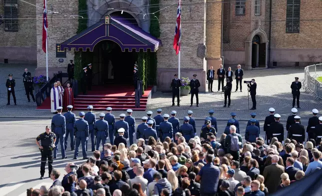 Military personnel wait in front of Oslo Cathedral ahead of the procession for the funeral of Norway's King Harald V in Oslo, Wednesday, Sept. 9, 2026. (AP Photo/Markus Schreiber)