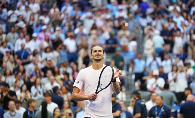 Alexander Zverev, of Germany, celebrates winning a match against Karen Khachanov, of Russia, during the men's singles semifinals of the U.S. Open tennis championships, Friday, Sept. 11, 2026, in New York. (AP Photo/Kirsty Wigglesworth)