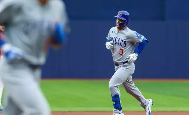 Chicago Cubs designated hitter Alex Bregman (3) rounds the bases after hitting a two-run home run in the first inning of a baseball game against the Boston Red Sox, Sunday, Sept. 27, 2026, in St. Petersburg, Fla. (AP Photo/Chris Urso)