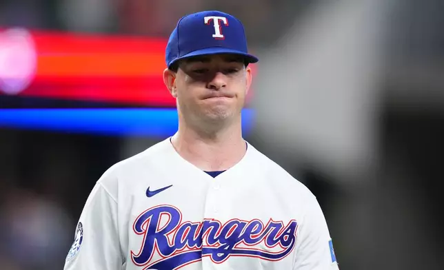 Texas Rangers starting pitcher Cody Bradford heads to the dugout after pitching to the Athletics during the first inning of a baseball game Wednesday, Sept. 2, 2026, in Arlington, Texas. (AP Photo/Julio Cortez)