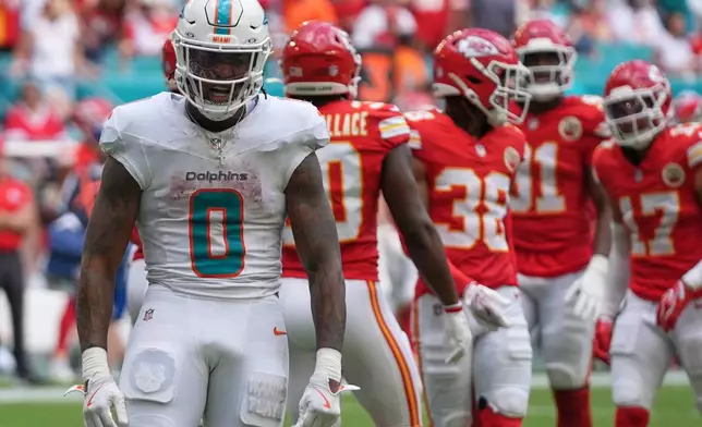 Miami Dolphins Ollie Gordon II (0) celebrates first down during an NFL football game against the Kansas City Chiefs, Sunday, Sept. 27, 2026, in Miami Gardens. (AP Photo/Lynne Sladky)