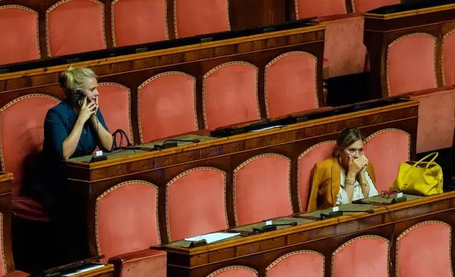 Italian senators attend a debate in Rome, Wednesday, Sept. 16, 2026, after the vote on the Nuclear Energy Bill was postponed a week. (AP Photo/Gregorio Borgia)