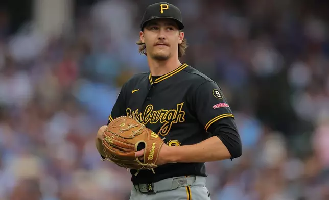 Pittsburgh Pirates' Bubba Chandler exits during the sixth inning of a baseball game against the Chicago Cubs, Sunday, Sept. 13, 2026, in Chicago. (AP Photo/Melissa Tamez)