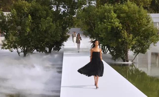 A model wears a creation as part of the Christian Dior Womenswear Spring Summer 2027 collection presented in Paris, France, Tuesday, Sept. 29, 2026. (AP Photo/Thomas Padilla)