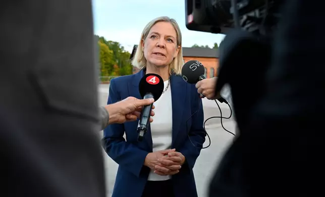 Social Democrats party leader Magdalena Andersson arrives for a party leadership televised debate in Gävle, Sweden, on Friday, Sept. 11, 2026. (Anders Wiklund/TT News Agency via AP)