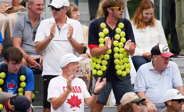 Fans watch a match between Mananchaya Sawangkaew, of Thailand, and Leylah Fernandez, of Canada, during the second round of the U.S. Open tennis championships Wednesday, Sept. 2, 2026, in New York. (AP Photo/Seth Wenig)