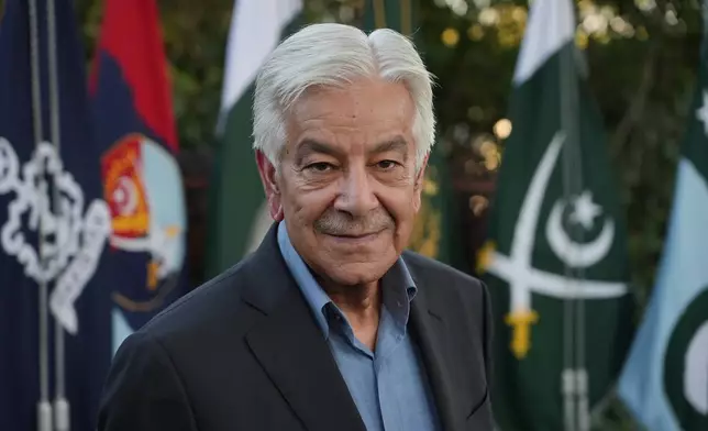 Pakistan's Defense Minister Khawaja Mohammad Asif pose for the camera at the Pakistani Embassy in Rome, Italy, Tuesday, Sept. 29, 2026. (AP Photo/Andrea Rosa)