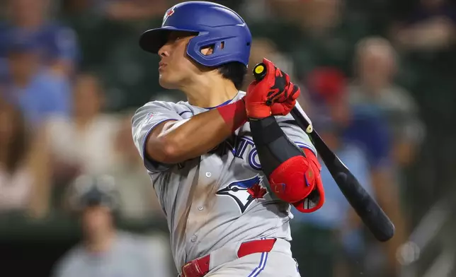 Toronto Blue Jays' Kazuma Okamoto hits a single during the sixth inning of a baseball game against the Athletics Tuesday, Sept. 8, 2026, in West Sacramento, Calif. (AP Photo/Scott Marshall)