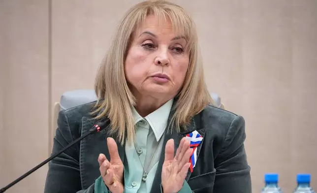 Ella Pamfilova, head of Russia's Central Election Commission, applauds after reporting the official results of Russia's parliamentary elections at the commission's meeting in Moscow, Russia, Friday, Sept. 25, 2026. (AP Photo/Alexander Zemlianichenko)