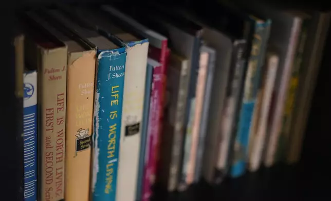 Books written by the late Archbishop Fulton Sheen at the Sheen Museum in Peoria, Ill., on July 15, 2026. (AP Photo/Jessie Wardarski)