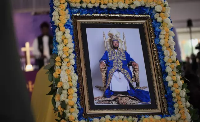 A portrait of Tooro's King Oyo Nyimba is displayed inside St. John's Cathedral in Fort Portal, Uganda, near the Congo border, Saturday, Sept. 12, 2026. (AP Photo/Patrick Onen)