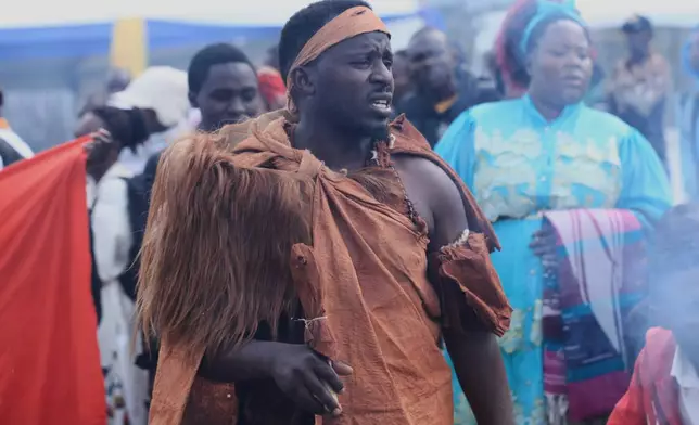 Mourners gather for the funeral of Tooro's King Oyo Nyimba in the remote city of Fort Portal, near the Congo border in Uganda, Saturday, Sept. 12, 2026. (AP Photo/Patrick Onen)