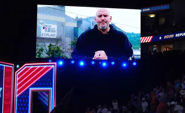 A video featuring Sen. John Fetterman, D-Pa., plays at the Republican convention Wednesday, Sept. 9, 2026, in Dallas. (AP Photo/Alex Brandon)