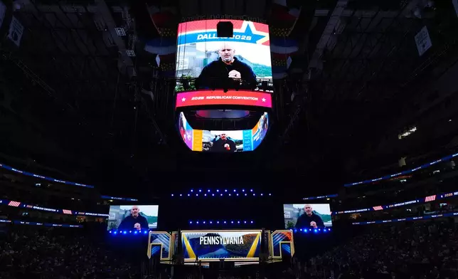 Pennsylvania Sen. John Fetterman introduces Sen. Dave McCormick at the Republican convention in Dallas, Wednesday, Sept. 9, 2026. (AP Photo/Tony Gutierrez)