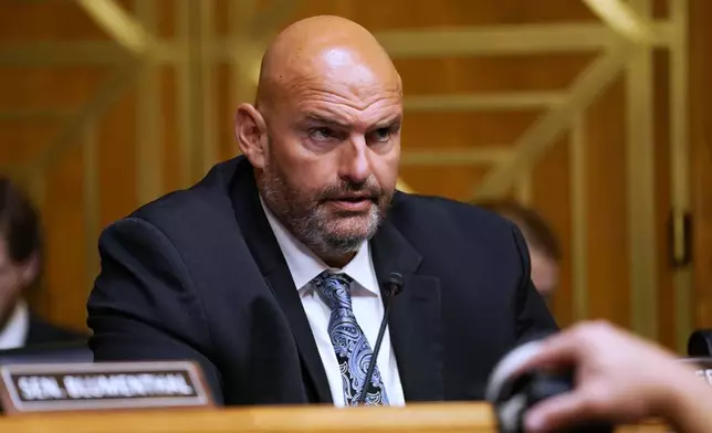 FILE - Sen. John Fetterman, D-Pa., speaks as Dr. Anthony Fauci appears before the Senate Homeland Security and Governmental Affairs Committee at the Capitol, July 29, 2026, in Washington. (AP Photo/Allison Robbert, File)