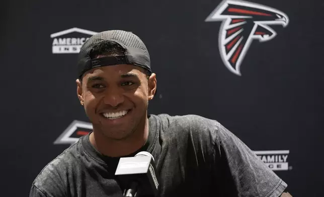 Atlanta Falcons quarterback Tua Tagovailoa speaks at a news conference after an NFL preseason football game against the Miami Dolphins, Friday, Aug. 28, 2026, in Miami Gardens, Fla. (AP Photo/Lynne Sladky)