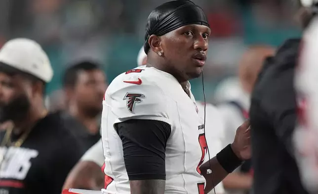 Atlanta Falcons quarterback Michael Penix Jr. stands on the sideline during the second half of an NFL preseason football game against the Miami Dolphins, Friday, Aug. 28, 2026, in Miami Gardens, Fla. (AP Photo/Lynne Sladky)