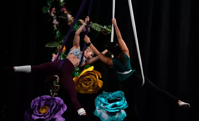 Cast members rehearse at The Cirk, a professional circus company in Johannesburg, Thursday, Aug. 27, 2026. (AP Photo/Themba Hadebe)