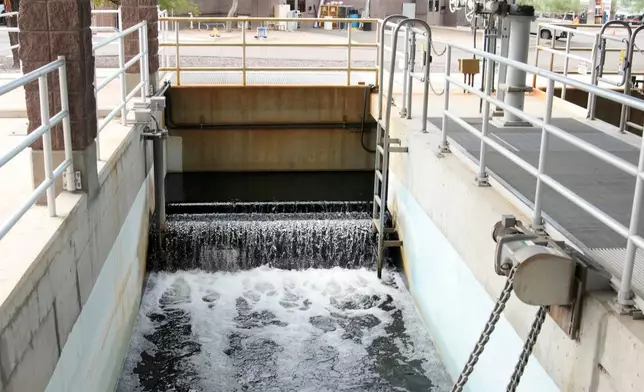 Water flows through part of the standard wastewater treatment A+ effluent tertiary filter system at the Scottsdale Water Campus on Wednesday, Sept. 9, 2026, in Scottsdale, Ariz. (AP Photo/Ross D. Franklin)