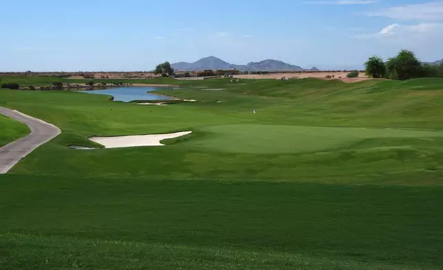 The 18th green at the TPC Scottsdale, a golf course that gets their water from the Scottsdale Water Campus, is seen Wednesday, Sept. 9, 2026, in Scottsdale, Ariz. (AP Photo/Ross D. Franklin)