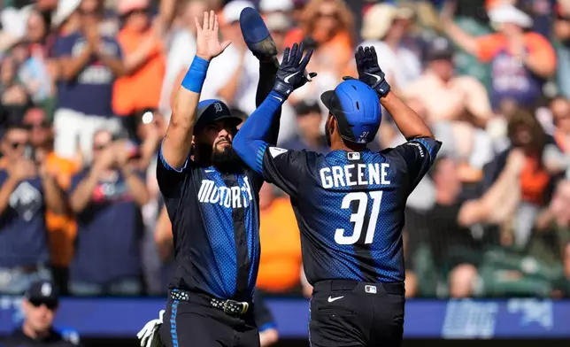 Detroit Tigers' Riley Greene (31) celebrates his two-run home run with Gleyber Torres against the Minnesota Twins during the fifth inning of a baseball game Monday, Sept. 7, 2026, in Detroit. (AP Photo/Paul Sancya)