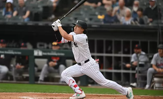 Chicago White Sox's Munetaka Murakami watches his RBI single during the first inning of a baseball game against the Detroit Tigers Saturday, Sept. 19, 2026, in Chicago. (AP Photo/Paul Beaty)