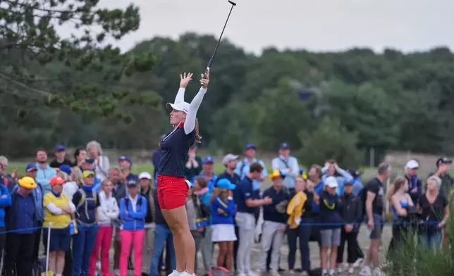 Jennifer Kupcho of the United States celebrates after holing a putt on the 18th green during the Solheim Cup in Den Bosch, Netherlands, Saturday, Sept. 12, 2026. (AP Photo/Alastair Grant)