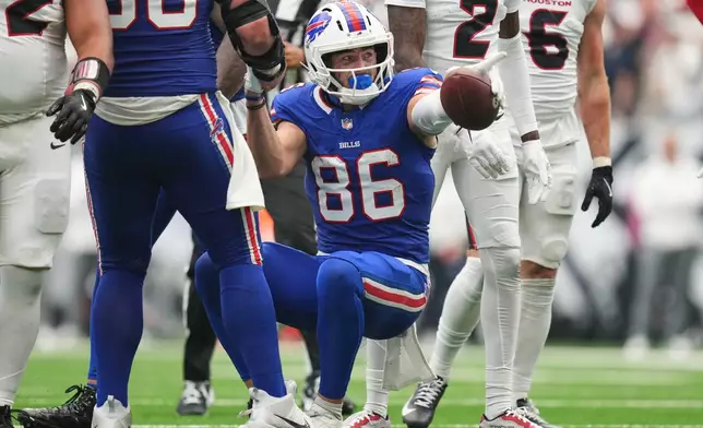 Buffalo Bills tight end Dalton Kincaid (86) signals after a first down reception during the second half of an NFL football game against the Houston Texans, Sunday, Sept. 13, 2026, in Houston. (AP Photo/Eric Christian Smith)