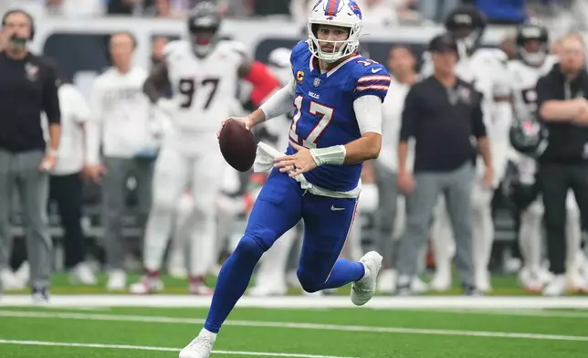 Buffalo Bills quarterback Josh Allen (17) runs the ball against the Houston Texans during the first half of an NFL football game, Sunday, Sept. 13, 2026, in Houston. (AP Photo/Eric Christian Smith)